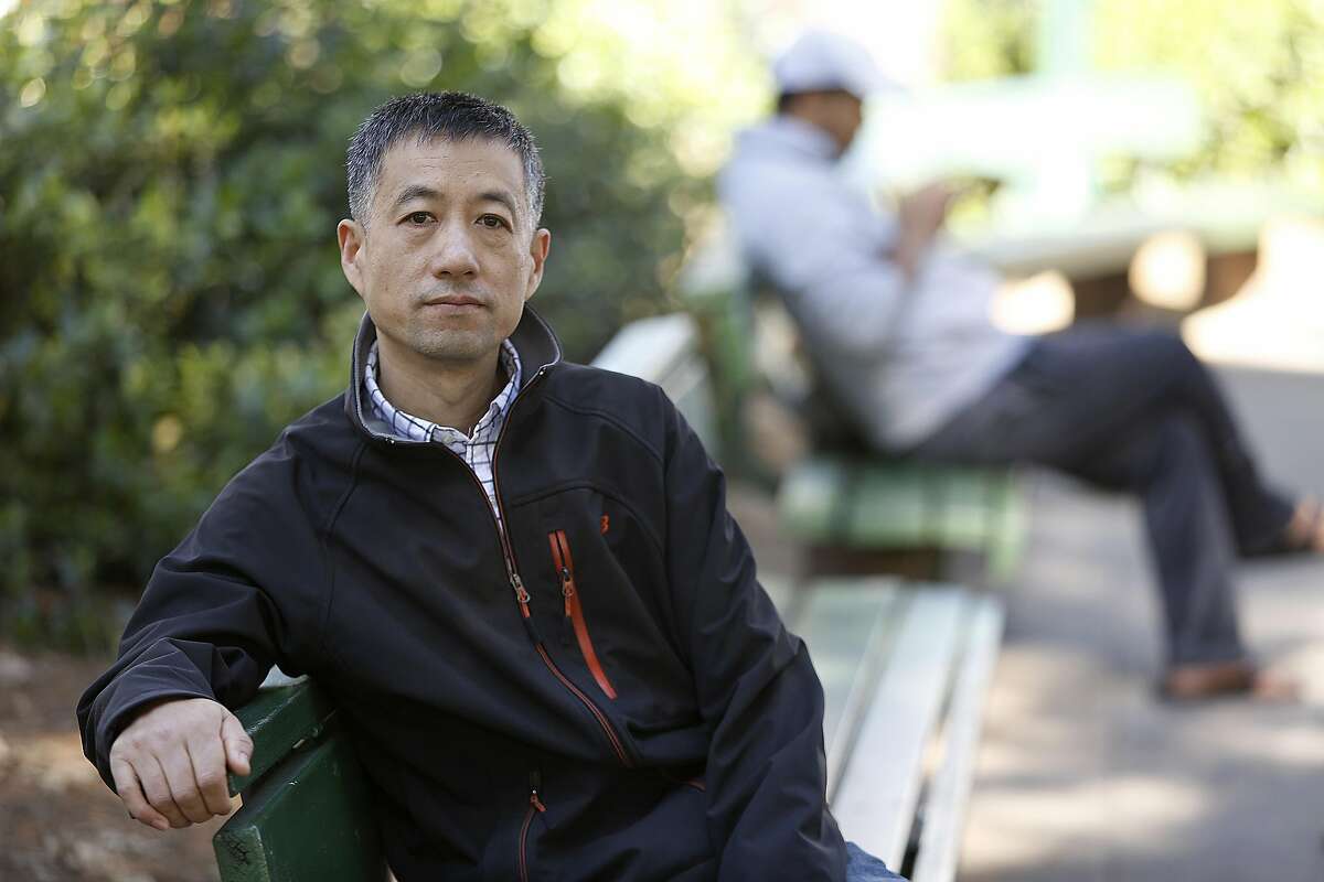 Jim Chen worked at UCSF as a janitor for over 3 years making $18 an hour and talks about his pay cut last year to minimum wage at Washington Square in San Francisco, California, on monday, march 28, 2016.
