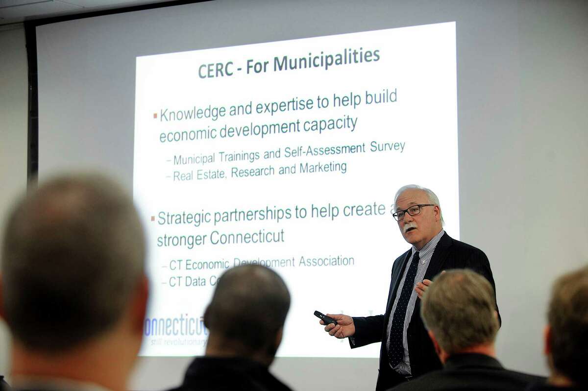 Bob Santy, president of Connecticut Economic Resource Center addresses a Danbury Regional Economic Development Forum held at Cartus in Danbury, Monday, March 28, 2016.