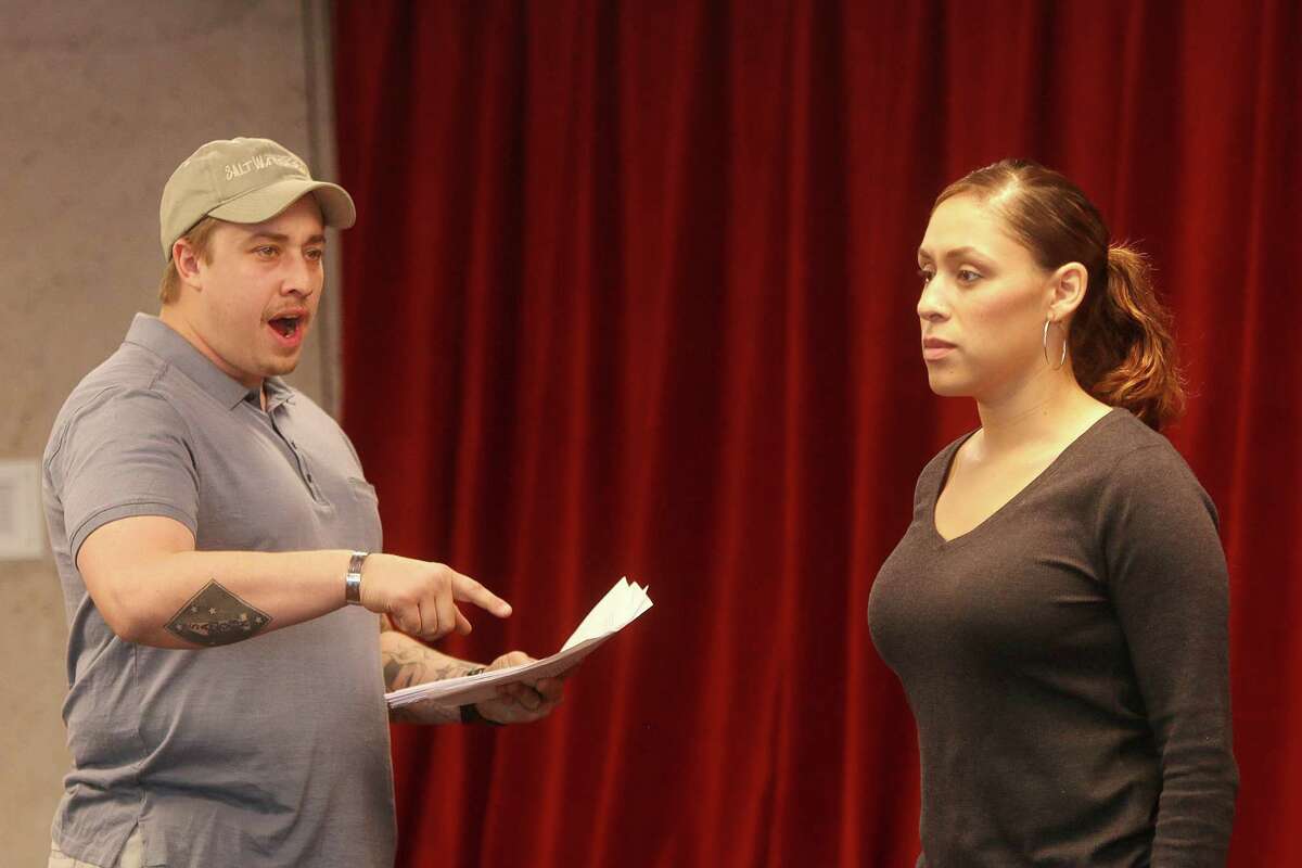 Military veterans Phil McCulloch and T'Liza Kiel rehearse a scene from The Telling Project's show, "Telling: Houston."