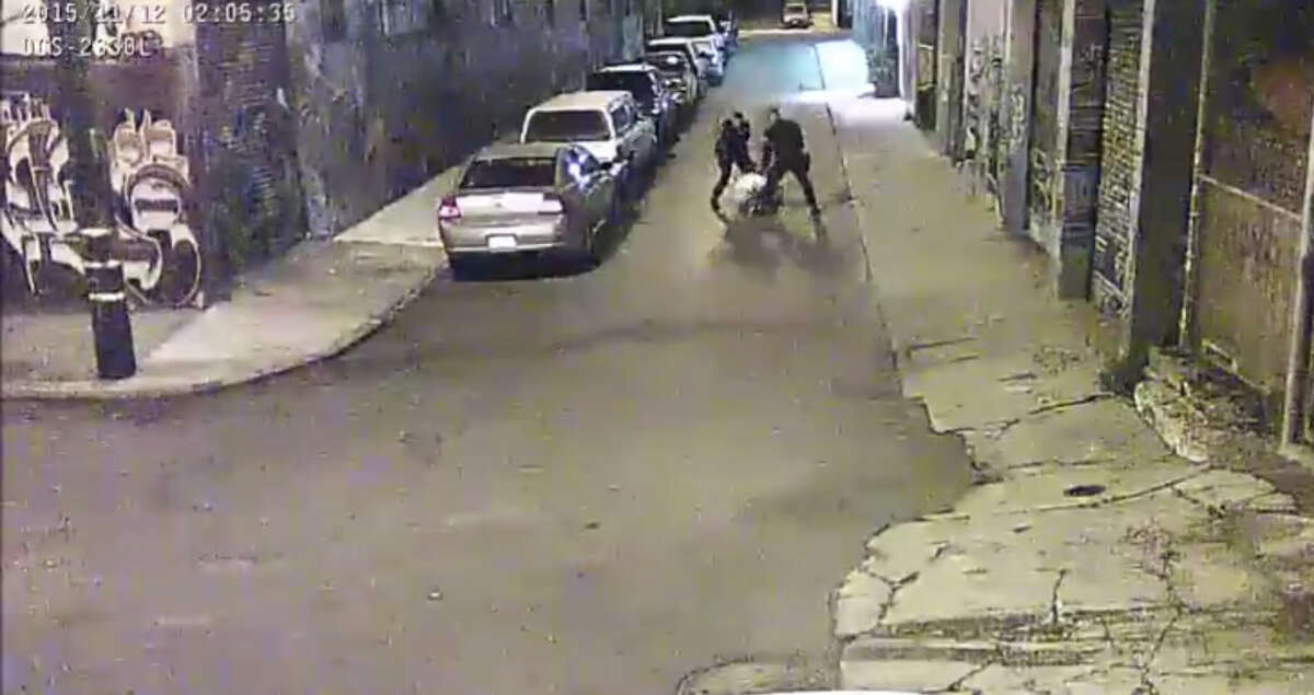 Two Alameda County Sheriff deputies are shown beating a man on Nov. 12, 2015 on a street in San Francisco's Mission District in a video screen grab provided by the San Francisco Public Defender's Office.