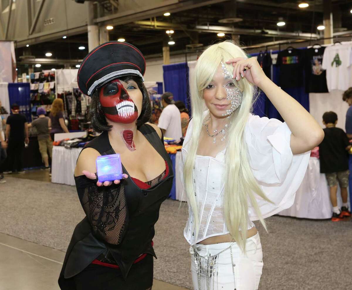 Fans pose for a photo at the 2015 Space City Comic Con at NRG Center Friday, July 24, 2015, in Houston. ( Jon Shapley / Houston Chronicle )