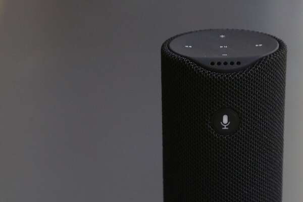 This Wednesday, March 2, 2016 photo shows an Echo Dot, left, and an Amazon Tap in San Francisco. Amazon.com is introducing two devices, the Amazon Tap and Echo Dot, that are designed to amplify the role that its voice-controlled assistant Alexa plays in people's homes and lives. (AP Photo/Jeff Chiu)