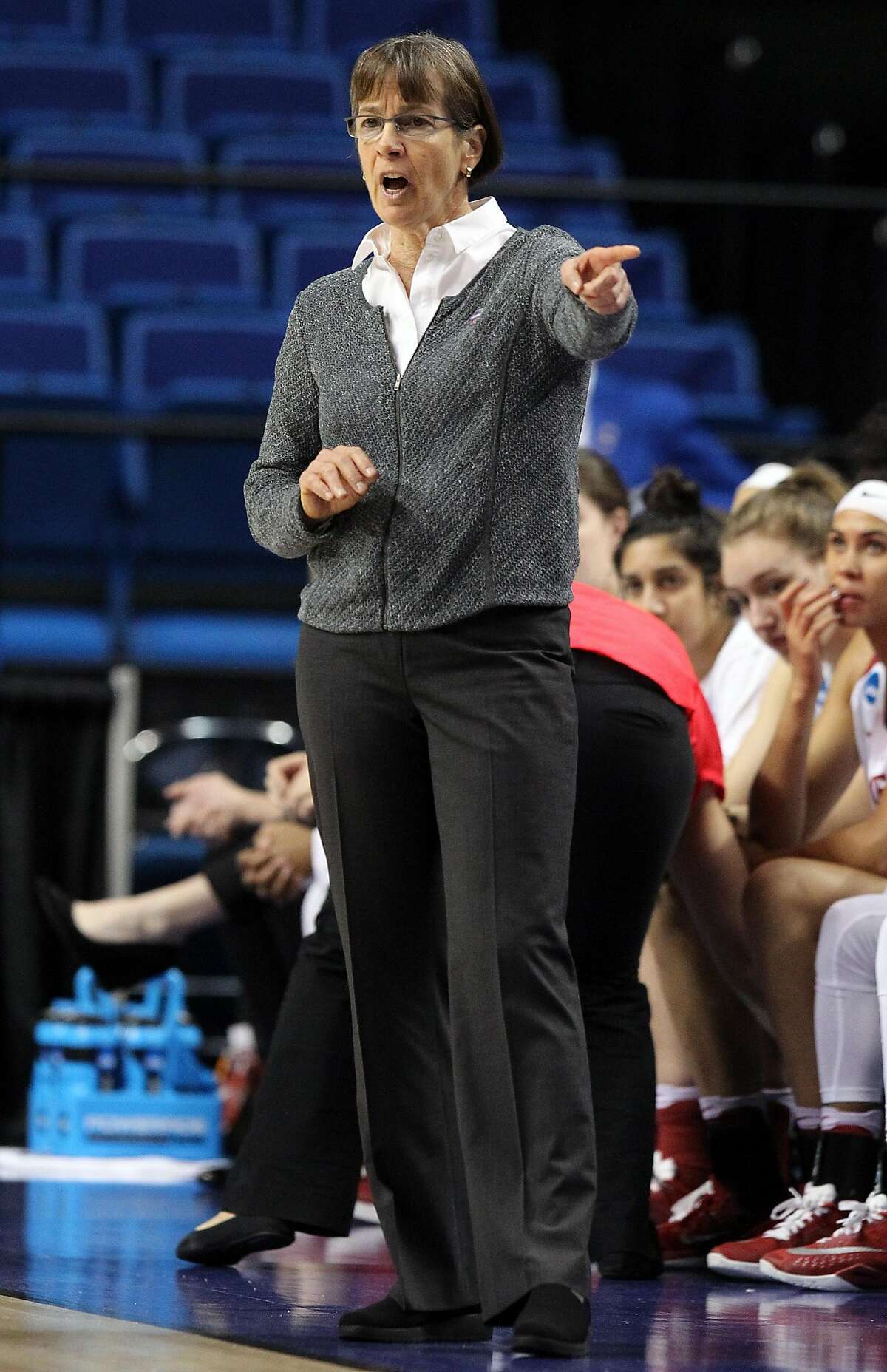 Stanford head coachTara VanDerveer directs her team during a regional final women's college basketball game in the NCAA Tournament against Washington in Lexington, Ky., Sunday, March 27, 2016. (AP Photo/James Crisp)