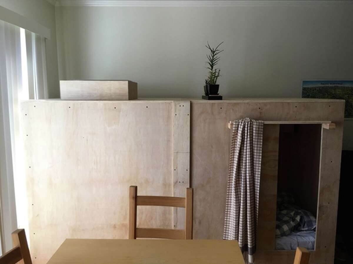 Illustrator Peter Berkowitz is avoiding San Francisco's high rent by paying only $400 to live in a box in a friend's living room.