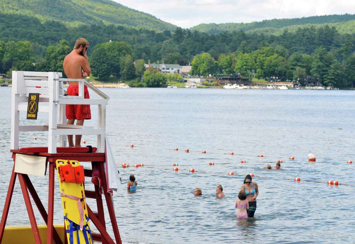 A lifeguard surveys the lake on Friday, Aug 21, 2015, at Million Dollar Beach in Lake George, N.Y. (Phoebe Sheehan/Special to The Times Union)