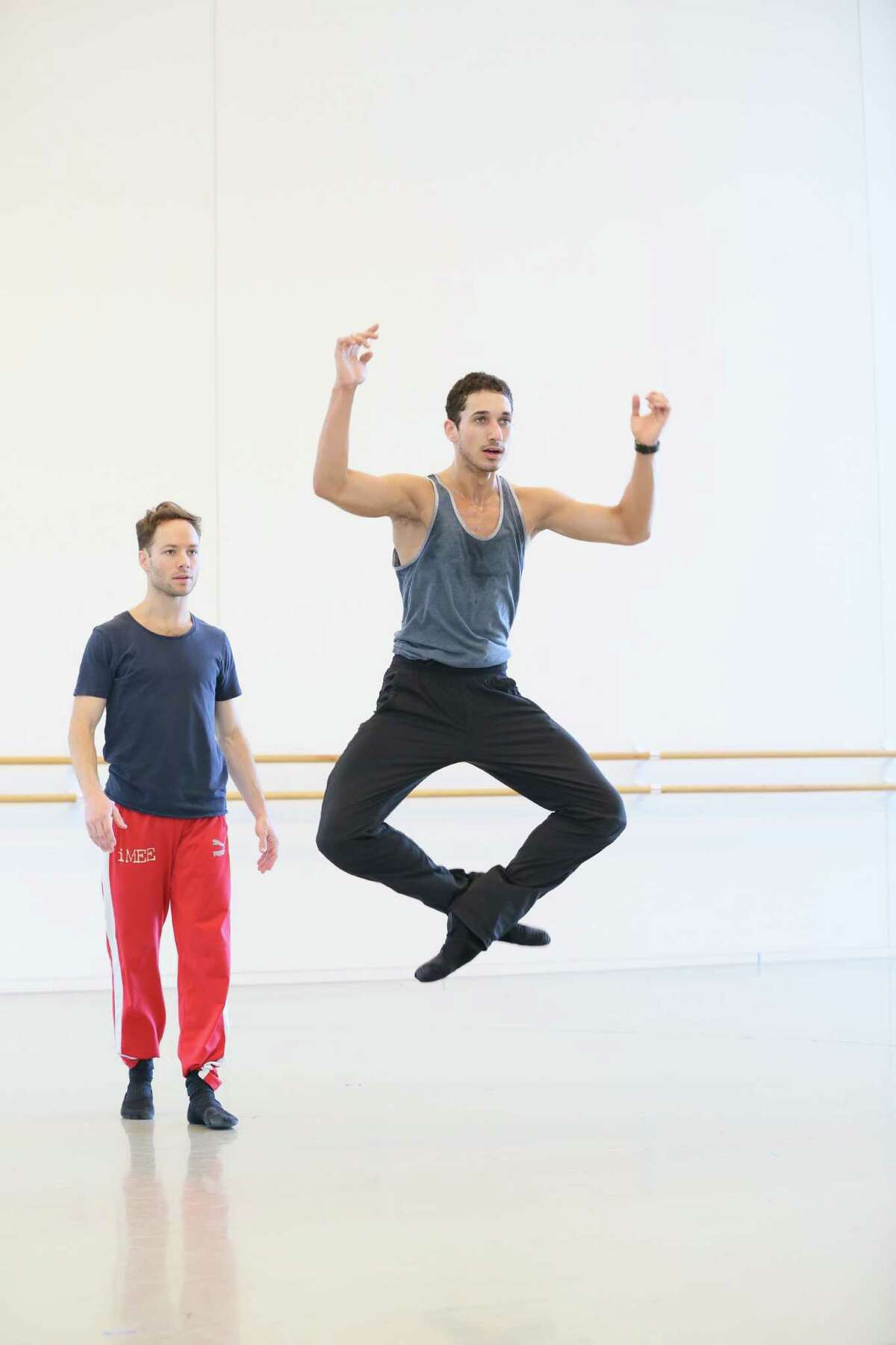 Oliver Halkowich, rear, rehearses dancer Shahar Dori, one of three Houston Ballet company members who will perform in Halkowich's new choreography for Project REACH.