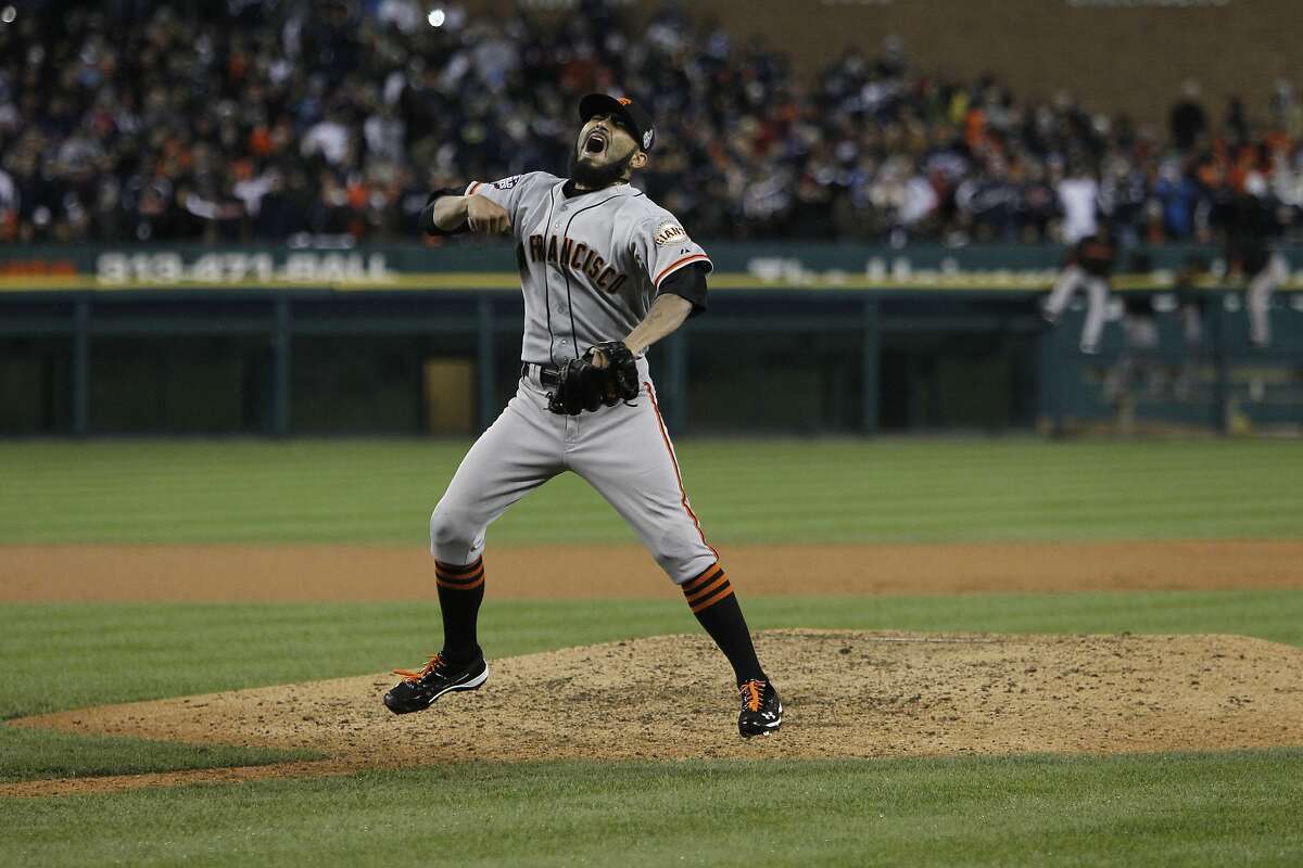 Giants' pitcher Sergio Romo celebrates his 10th inning strike out against Miguel Cabrera to win the World Series during game 4 of the World Series at Comerica Park on Sunday, Oct. 28, 2012 in Detroit, MI.