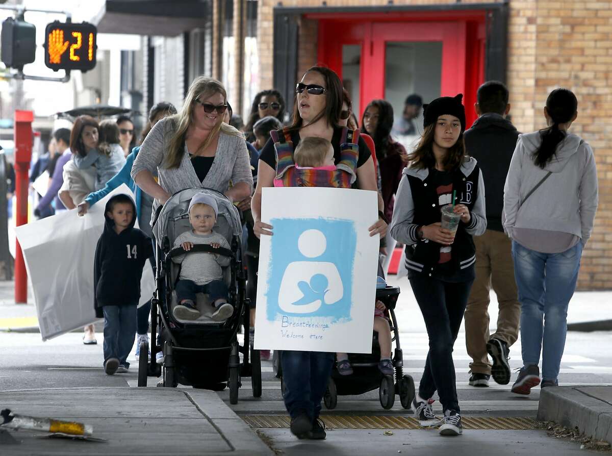 Mothers march with their children to the city's Human Services Agency in San Francisco, Calif. on Wednesday, March 30, 2016 for a group breast feeding after Mildred Musni was forced to cover up by a security guard when she attempted to breast feed her son Eliseo inside the facility a few months ago.
