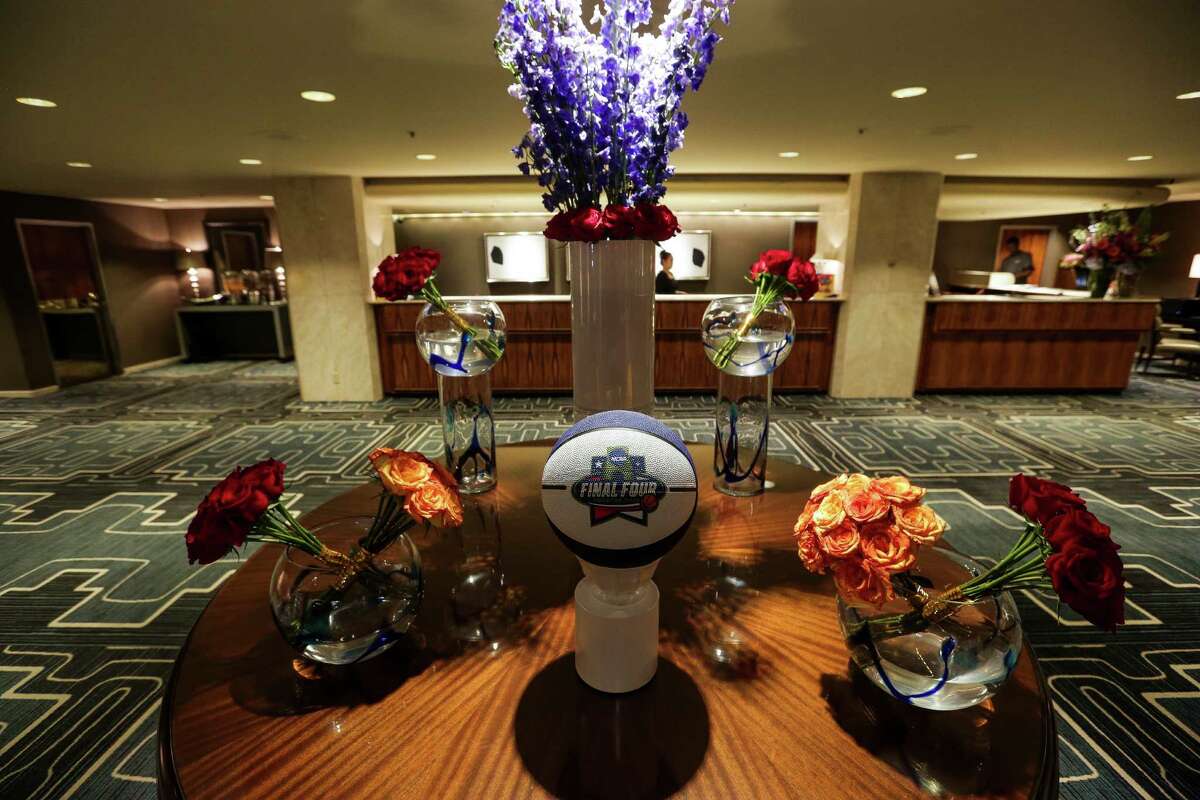 The Four Seasons hotel prepares for the Final Four on Wednesday in Houston. Some sports travel agencies are offering travel packages with tickets, VIP passes and ground transportation, among other goodies, to Final Four travelers at hotels like the Four Seasons. ( Michael Ciaglo / Houston Chronicle )