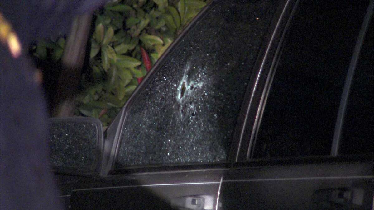 Police say a man was sitting in a vehicle on the West Side when a gunman opened fire Thursday night.