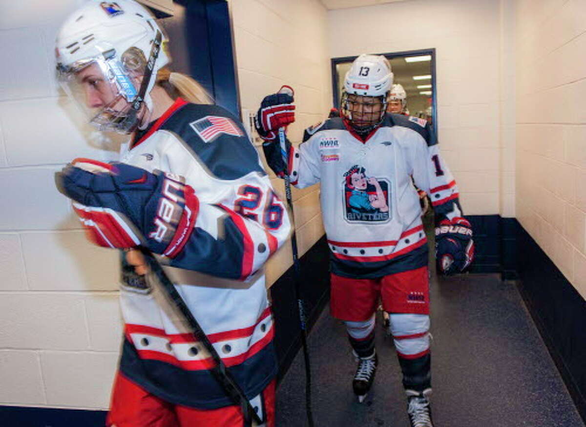 Former Fairfield resident Kiira Dosdall (26) heads to the ice to play with the New York Riveters prior to a recent National Women's Hockey League game against the Connecticut Whale at Yale’s Ingalls Rink.