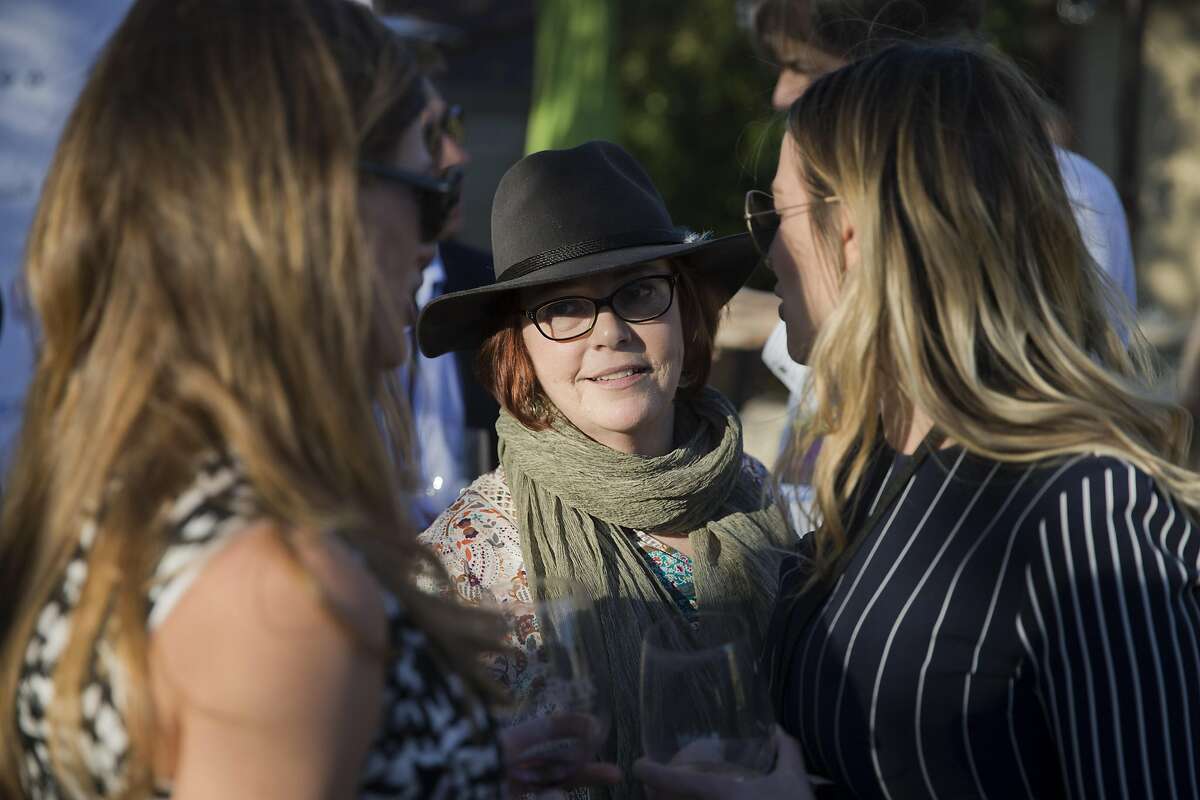 Claire Parr, center, chats with Cathi Williams, right, and Sarah Currry at the Yountville Live event in Yountville, Calif., on Thursday, March 31, 2016. Now in its second year, Yountville Live pairs national touring acts, such as the Goo Goo Dolls and Plain White T?s, with celeb wine country chefs and vinters, creating an only-in-Northern-California festival experience that aims to be more low-key and suited to the exclusive nature of the region than BottleRock.