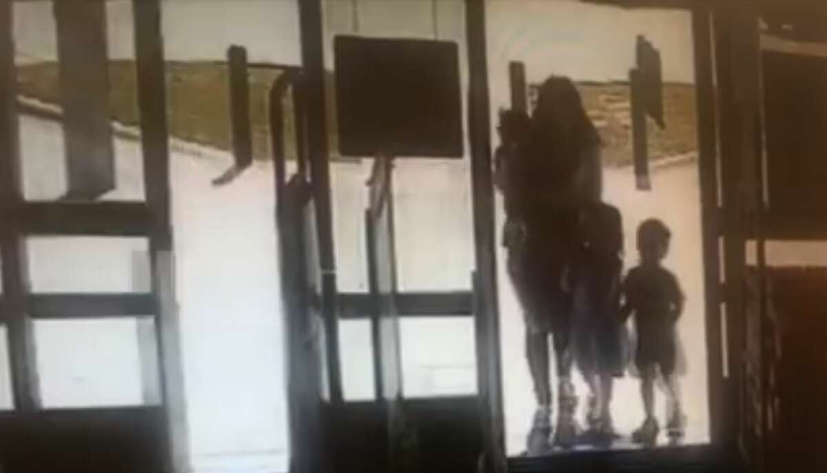 This security footage of Christine Thi Woo and her children outside a grocery store Monday March 28 is the last time Woo was seen alive with her children.
