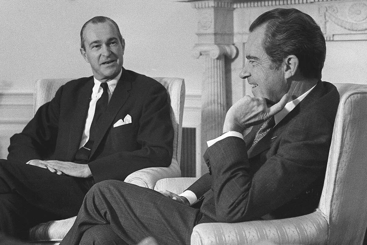 Ex CIA official Richard Helms (left), shown with President Richard Nixon in 1973, helped launch the program in the 1950s.