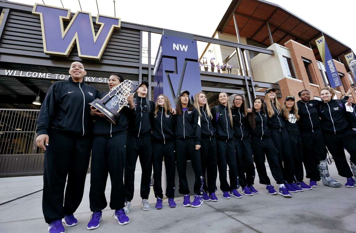 Players line up during a send-off rally for the Washington women's basketball team at Husky Stadium on Thursday, March 31, 2016, in Seattle.