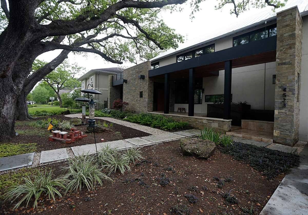 Mark and Lisa Livingston's Bellaire home is part of the Rice Design Alliance spring architecture tour. The couple built their home on a tree-filled lot two years ago.