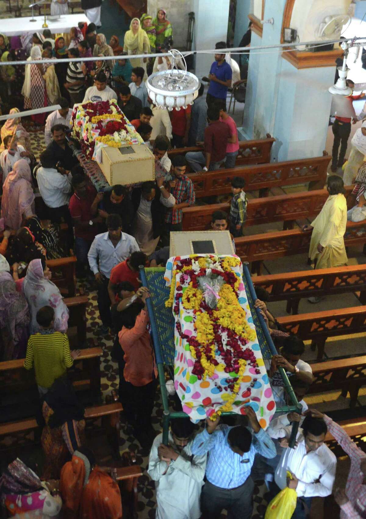Pakistani Christian mourners carry the coffins of victims of the March 27 suicide bombing from a church in Lahore. There exists something of a hierarchy of perceived importance attached to terrorist acts. but we should be concerned whenever and wherever terrorists slay innocents.