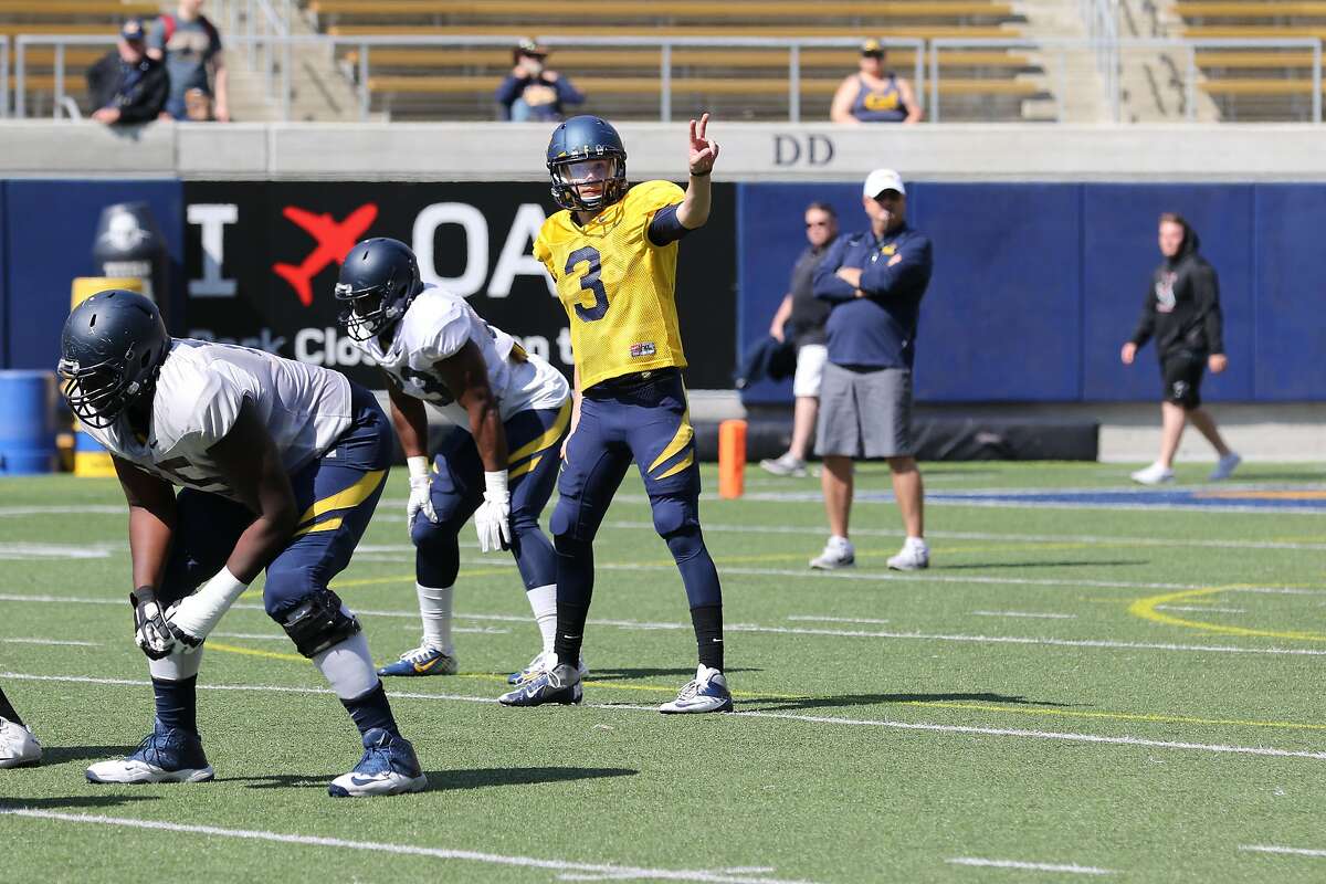 Cal quarterback Ross Bowers takes a signal at Saturday's scrimmage.
