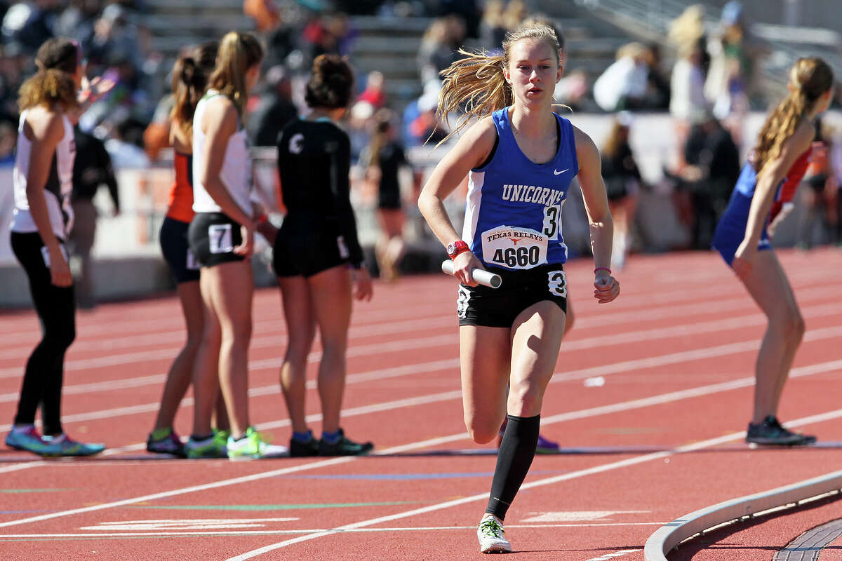 New Braunfels' Paige Hofstad takes off on the anchor leg of the high school girls 4x800 meter relay (section 2) during the Texas Relays at Mike A. Myers Stadium in Austin on Saturday, April 2, 2016. New Braunfels won the event with a time of 9 minutes, 45.37 seconds.