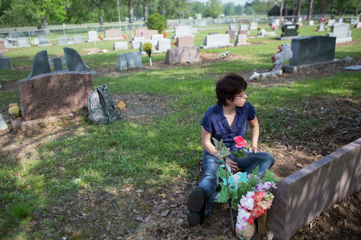Amy Beebe, 24, visits her brother's grave in Cleveland. Beebe's brother Joseph Beebe's death was ruled a homicide caused by "battered child syndrome." When Amy Beebe was 11, she testified in court against her adoptive mother Edith Beebe and talked about the abuses she experienced along with her siblings that eventually took the life of her brother Joseph.