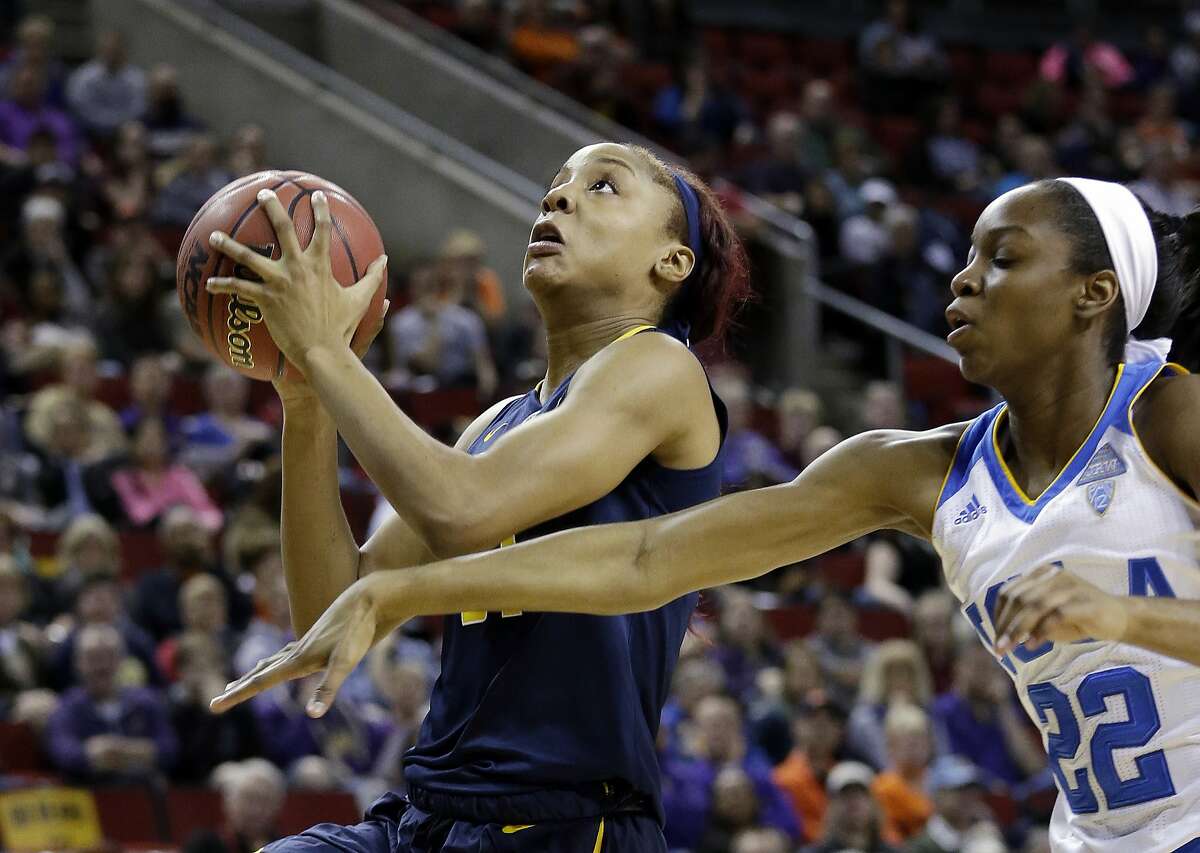 California's Kristine Anigwe, left, shoots as UCLA's Kennedy Burke defends during the first half of an NCAA college basketball game in the Pac-12 Conference women's tournament, Saturday, March 5, 2016, in Seattle. (AP Photo/Elaine Thompson)
