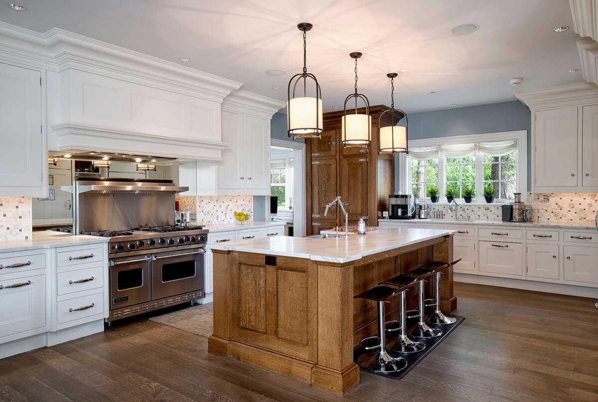 186 Shore Rd, Old Greenwich, CT 06870 6 beds 9 baths 8,803 sqft Peacock kitchen with Calacatta marble center isle and walk-in pantry View full listing on Zillow