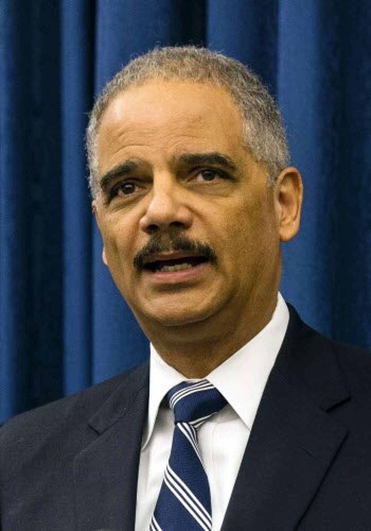 Eric Holder Fingerprinting rules are racist