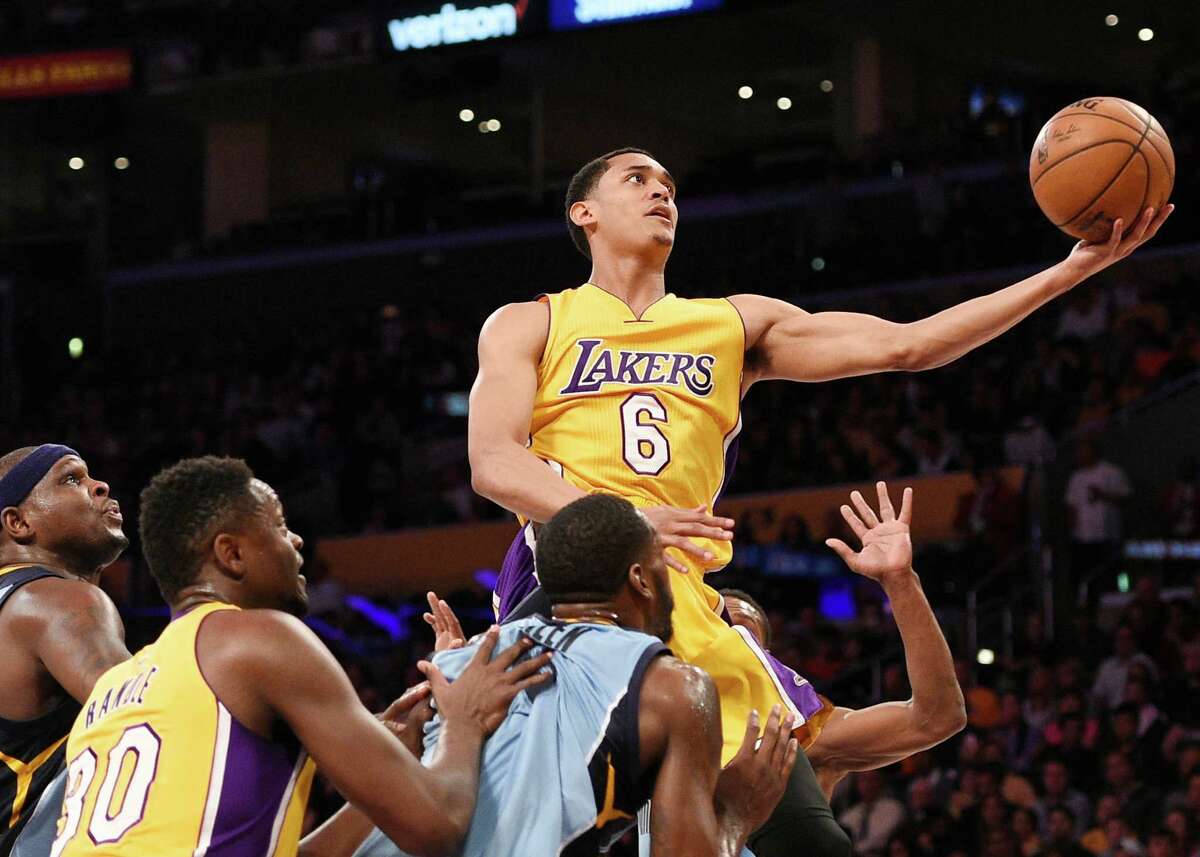 Los Angeles Lakers guard Jordan Clarkson (6) in action during the first half of an NBA basketball game against the Memphis Grizzlies in Los Angeles, Tuesday, March 22, 2016.