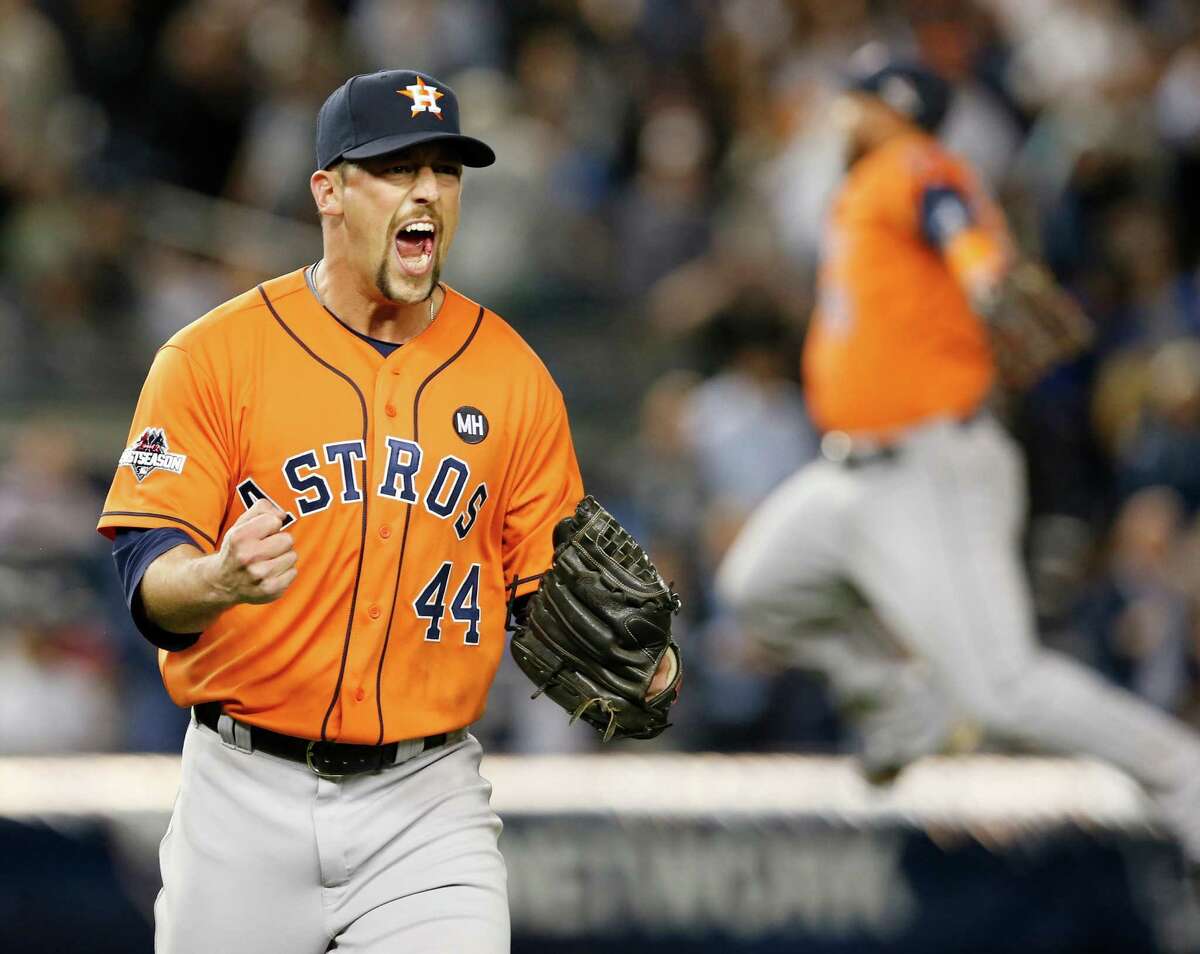 Houston Astros relief pitcher Luke Gregerson (44) reacts as a fellow teammate leaps in the air at the final out of the Astros’ 3-0 shutout of the Yankees in the American League wild-card game at Yankee Stadium in New York on Oct. 6, 2015. Gregerson has retained his role as the Houston Astros closer, winning out over newcomer Kevin Giles.