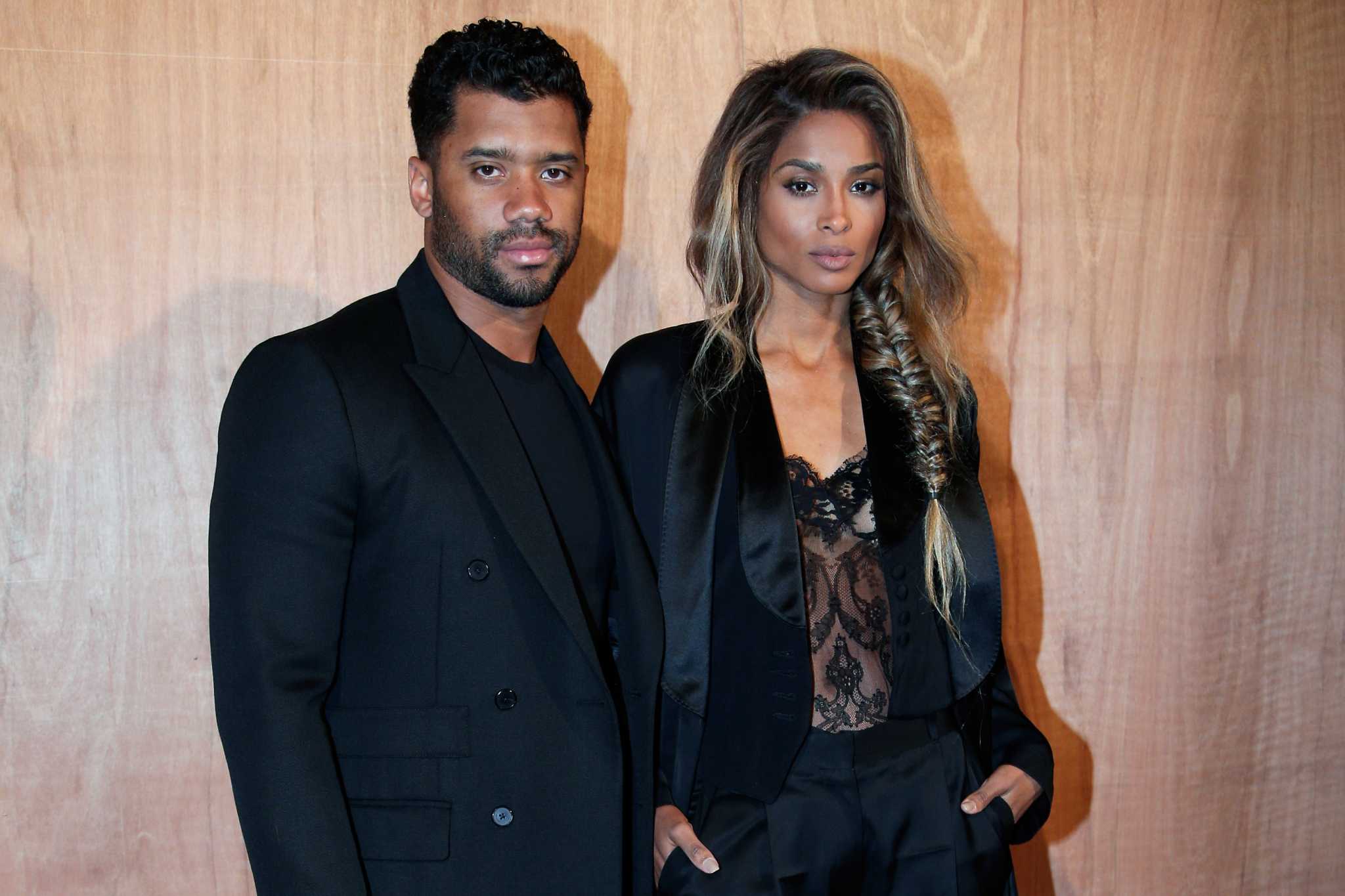 Liverpool gifts Russell Wilson and wife Ciara their own soccer