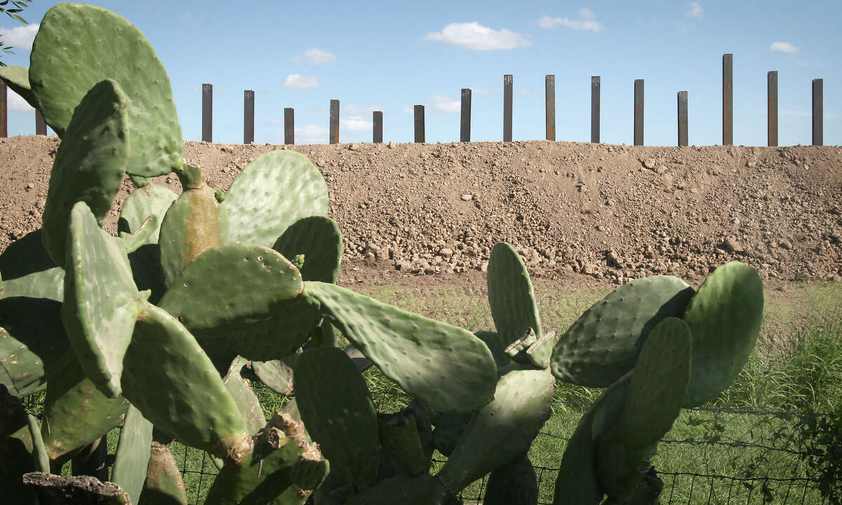 This 2008 file photo shows construction of already existing parts of the border fence in Granjeno, Texas, where residents fought its construction. Donald Trump has made building a permanent border wall a key part of hos presidential campaign. BOB OWEN/rowen@express-news.net