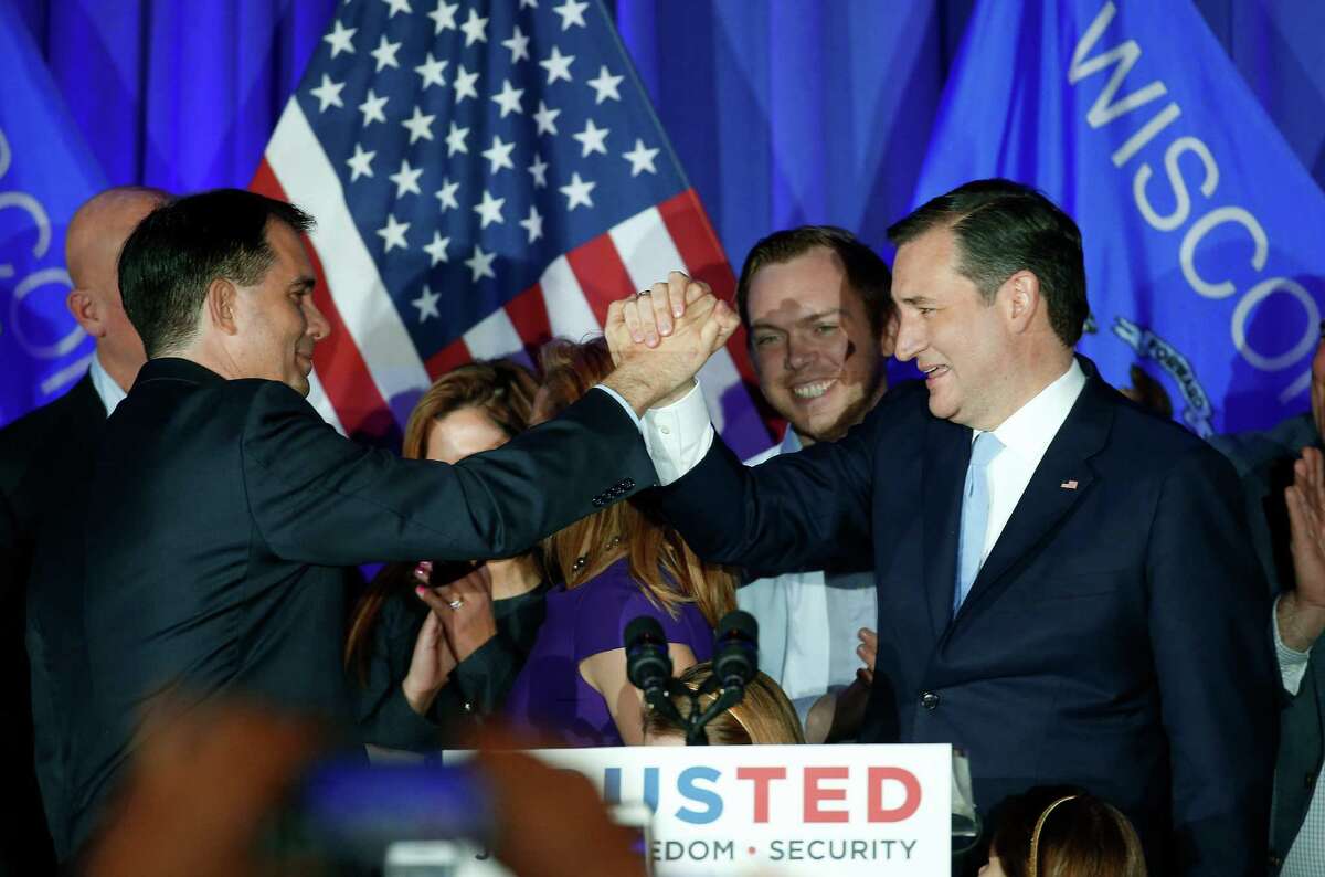 Sen. Ted Cruz, right, is congratulated by Wisconsin Gov. Scott Walker, whose endorsement helped Cruz top businessman Donald Trump by a significant margin in the Midwestern state that favors civility.