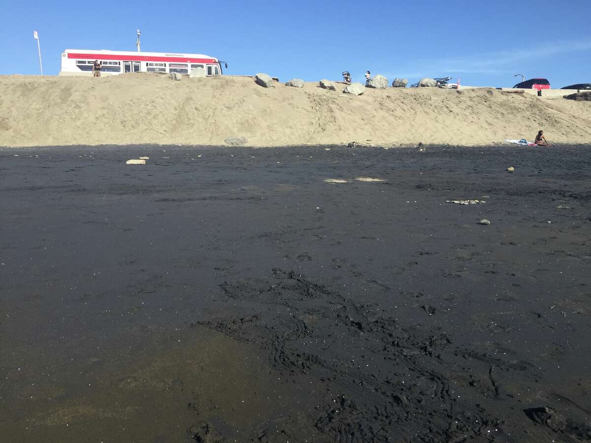 What's up with the black sand at Ocean Beach?