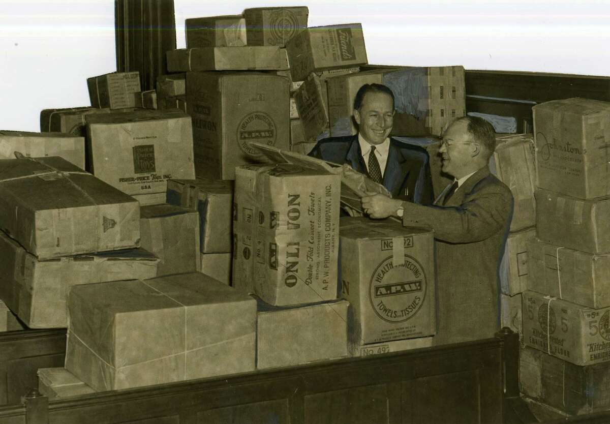 Mayor Erastus Corning and John Glenn, chairman of the toy collection campaign, with goods bound for the Dutch city of Nijmegen. (Times Union archive photo)