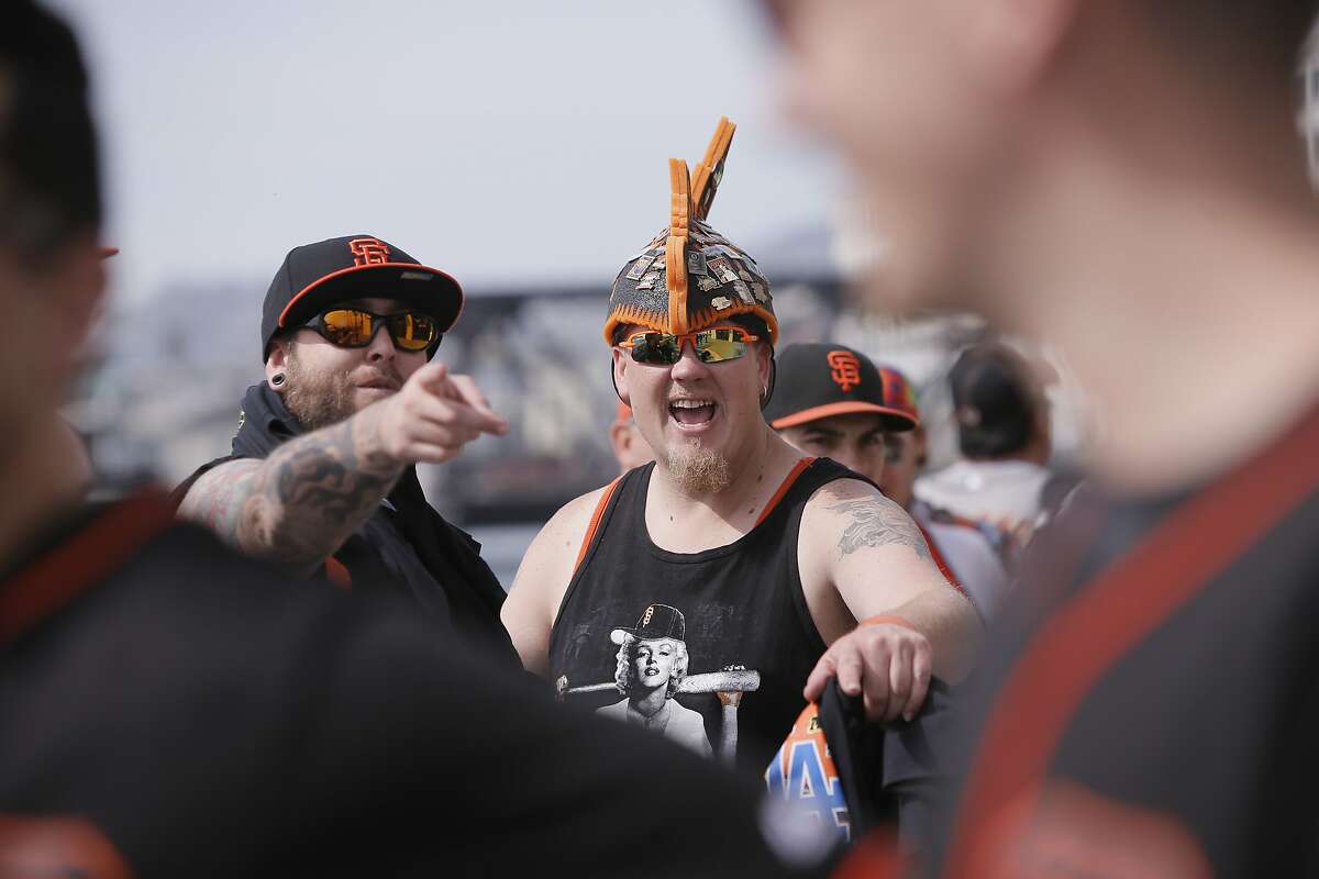 Jeremy Fowler, (left) and Bradley Beede of Fairfield wait for the gates to open, as the San Francisco Giants get set to take on the Los Angeles Dodgers during opening day of the 2016 MLB season, at AT&T Park in San Francisco, California on Thurs. April 7, 2016.