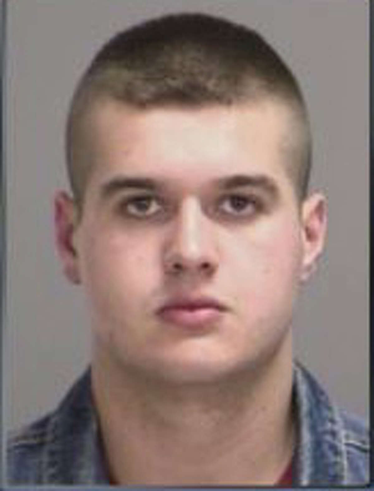 Garrett Kale, 18, was charged with illegally dumping a dog on Texas A&M University's campus in a "ritualistic" manner.