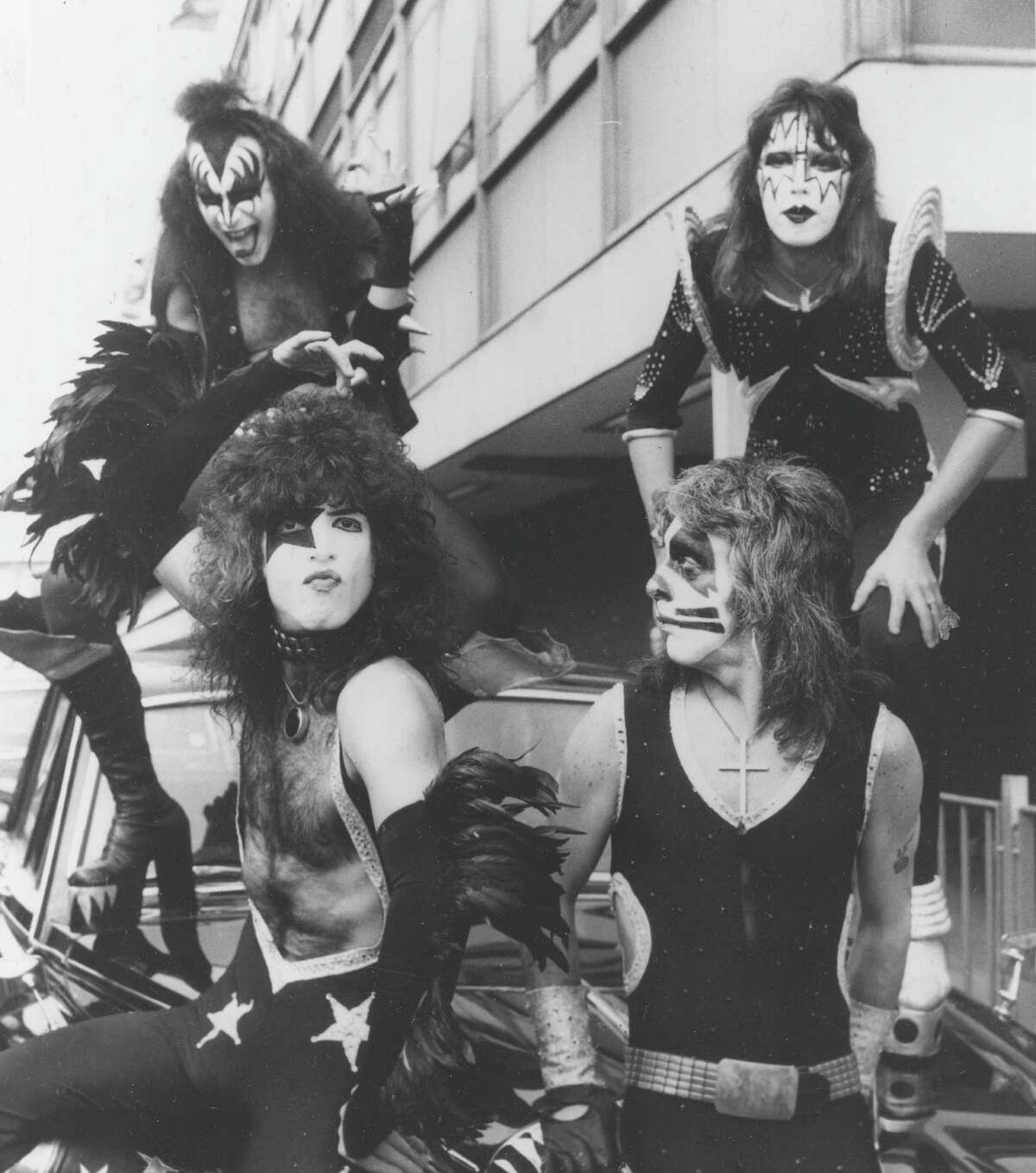American rock and roll legend KISS arrives at Heathrow Airport in London, on May 12, 1976, for their concert tour through Great Britain. In the back are bassist Gene Simmons, left, and guitarist Ace Frehley; in front are singer/guitarist Paul Stanley and drummer Peter Criss.