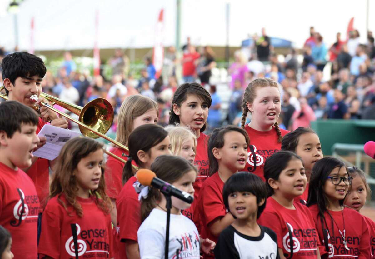 Children of Jensen's Yamaha Music School perform the Star Spangled Banner prior to the Springfield Cardinals at San Antonio Missions Texas League baseball game at Nelson Wolff Stadium on Thursday, April 7, 2016.