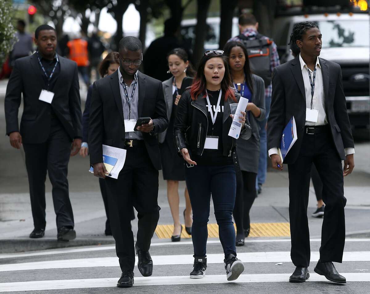 Stephanie Zau (center) from Intuit leads a team of students attending the Management Leadership for Tomorrow tech boot camp on a field exercise in San Francisco, Calif. on Friday, April 8, 2016. Eighty university students representing Black, Latino and Native American ethnicities participated in workshops focusing on careers in the tech industry.