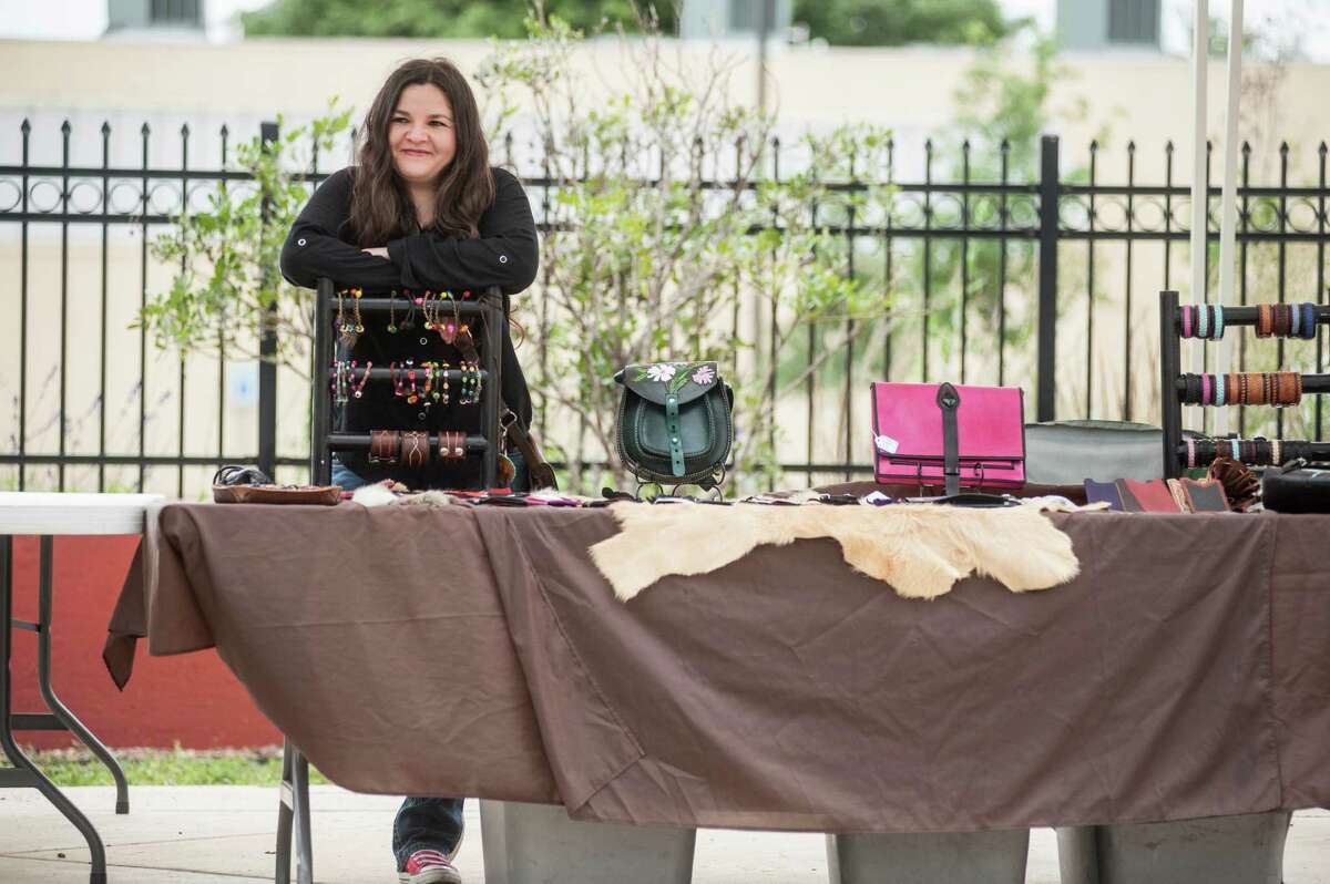 Malu Perumen owner of Libelula Leather waits for costumers during WestFest on Saturday, April 19th, 2016 in San Antonio. Carlos Javier Sanchez/For The Express News