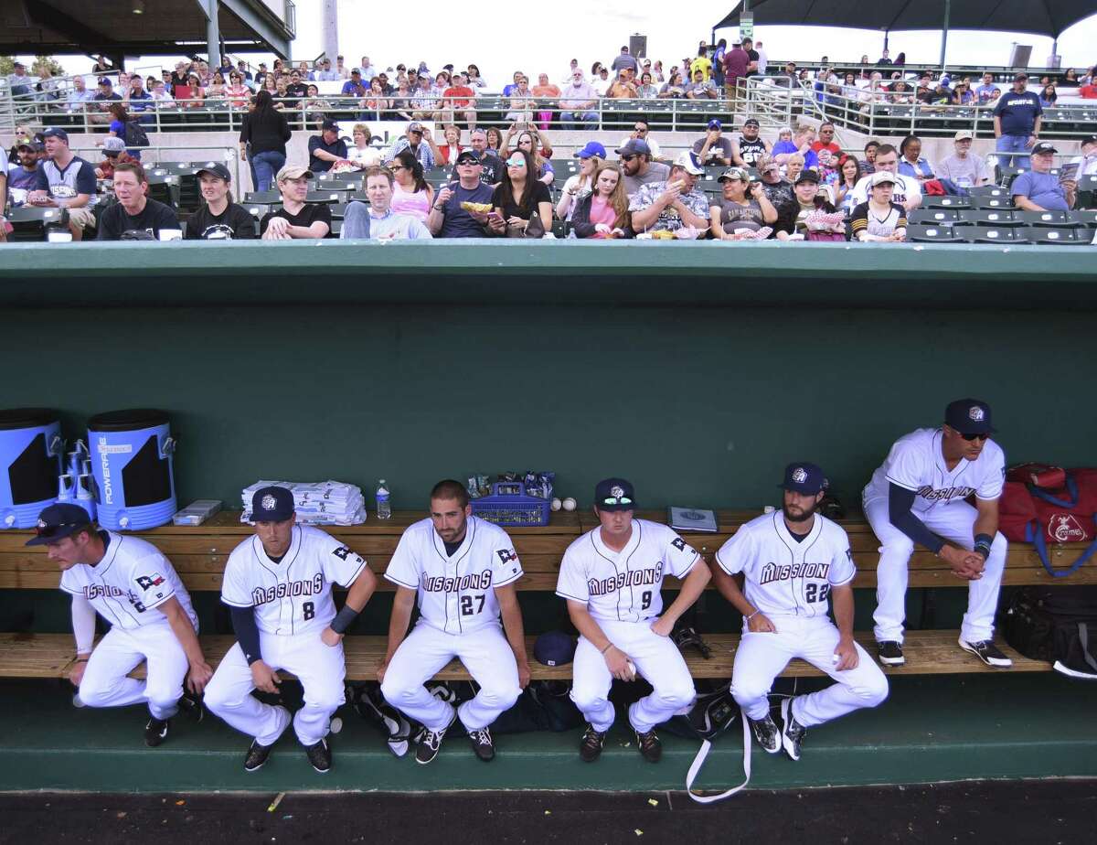 The San Antonio Missions relax in their dugout before taking on the Springfield Cardinals in their 2016 home opener at Nelson Wolff Stadium on Thursday, April 7, 2016.