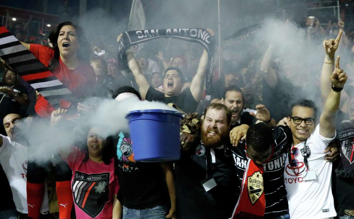 San Antonio FC fans celebrate after their first goal in the United Soccer League home opener against Swope Park Rangers on Saturday, April 9 2016