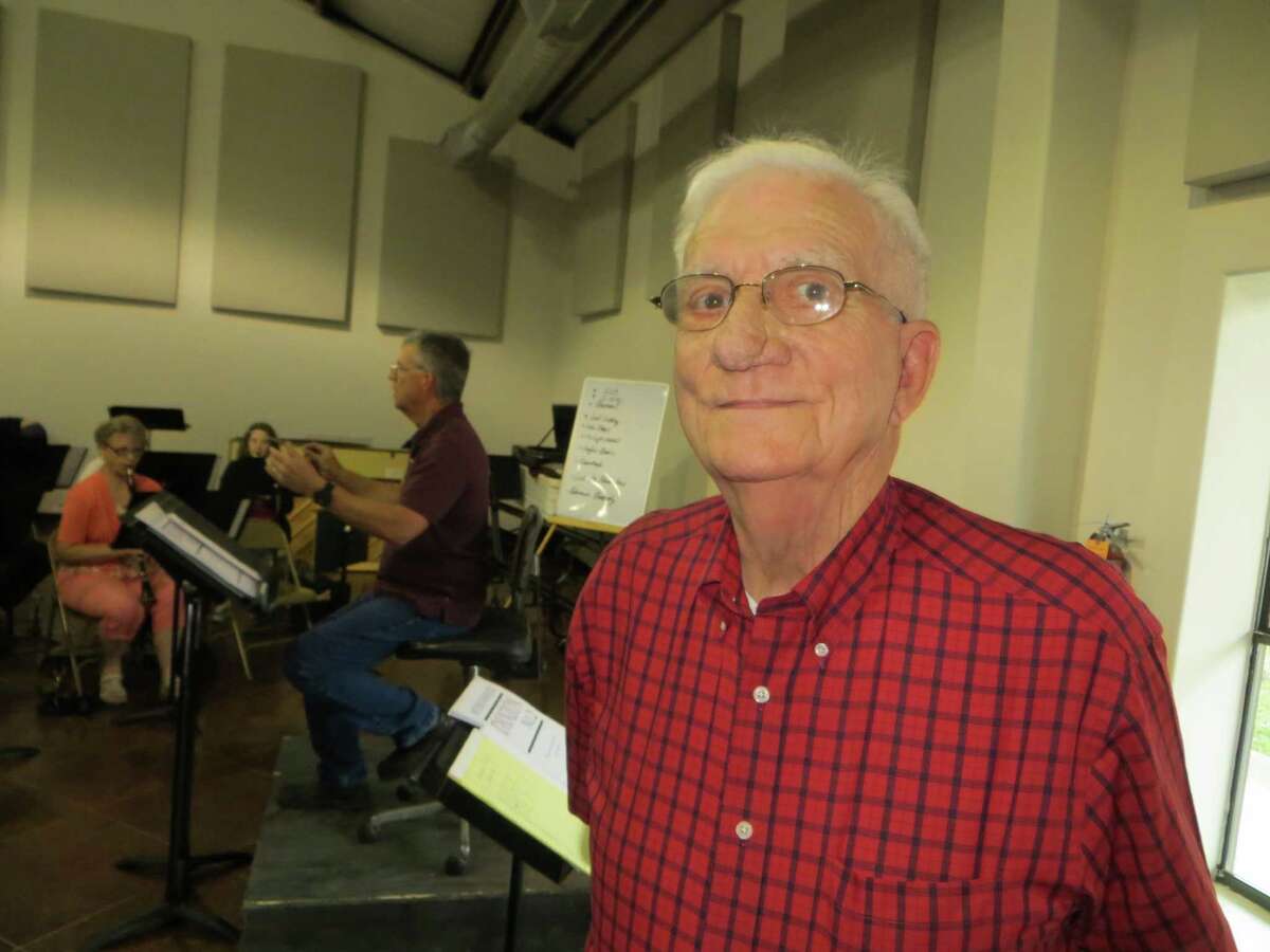 Charles Kuentz Jr. (foreground), director emeritus of the Helotes Area Community Band, still shares conducting duties with his son, Charles “Chuck” Kuentz (rear).