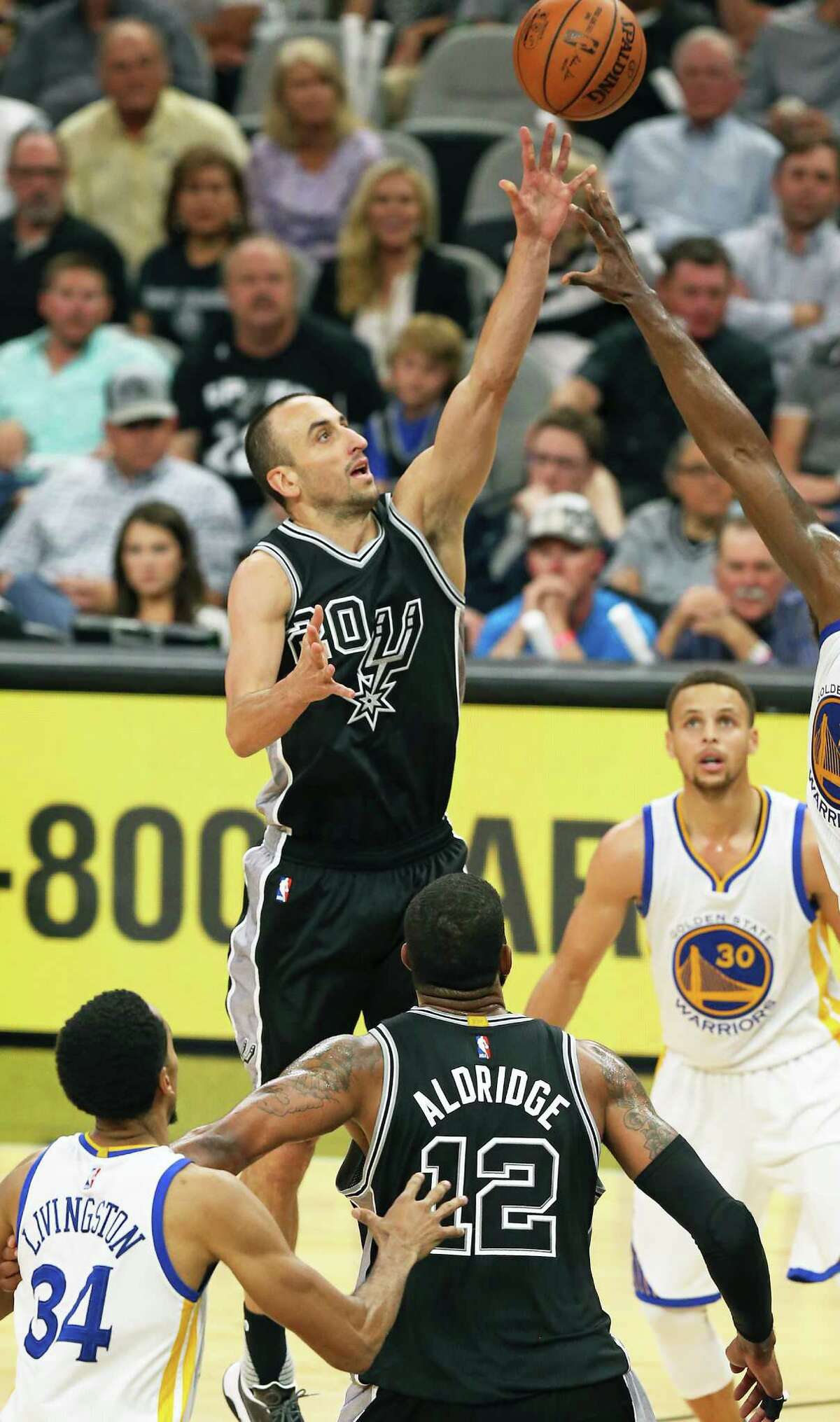 Manu Ginobili hoists a jumper in the second half as the Spurs host Golden State at the AT&T Center on April 10, 2016.