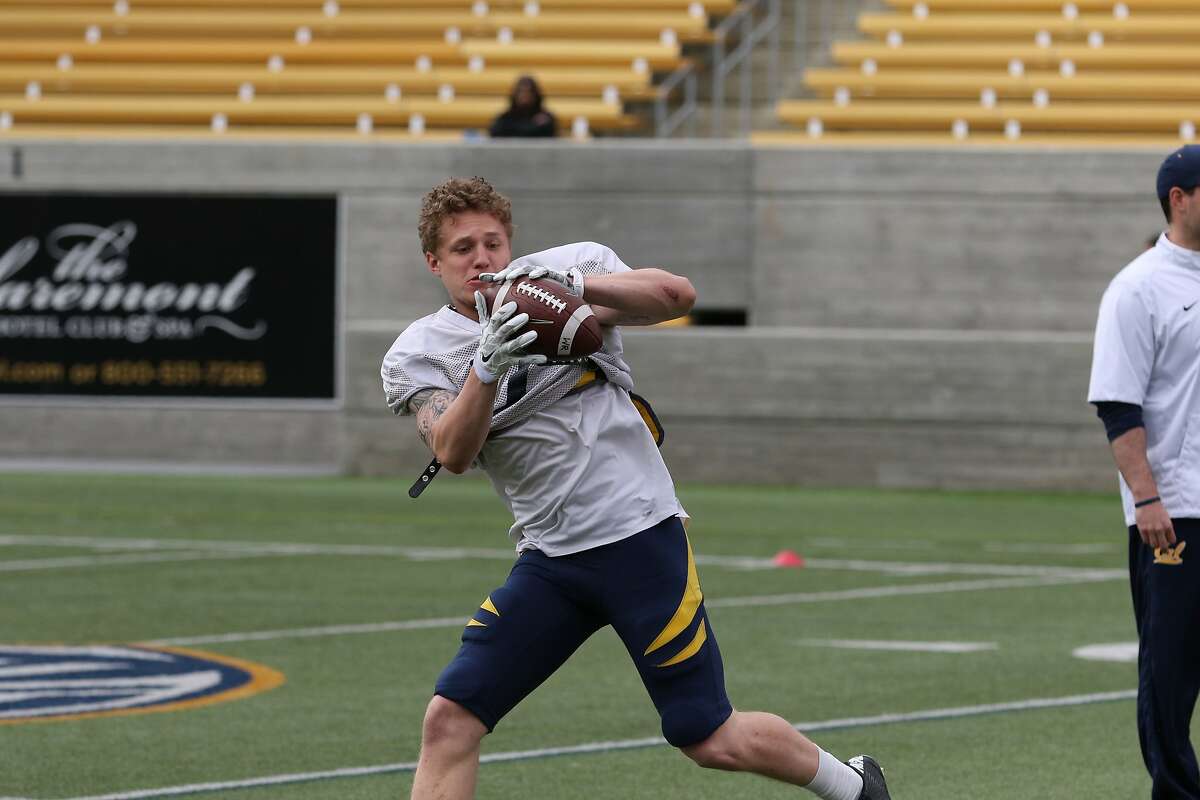 Wide receiver Vic Wharton takes a pass in spring practice at Cal this month.