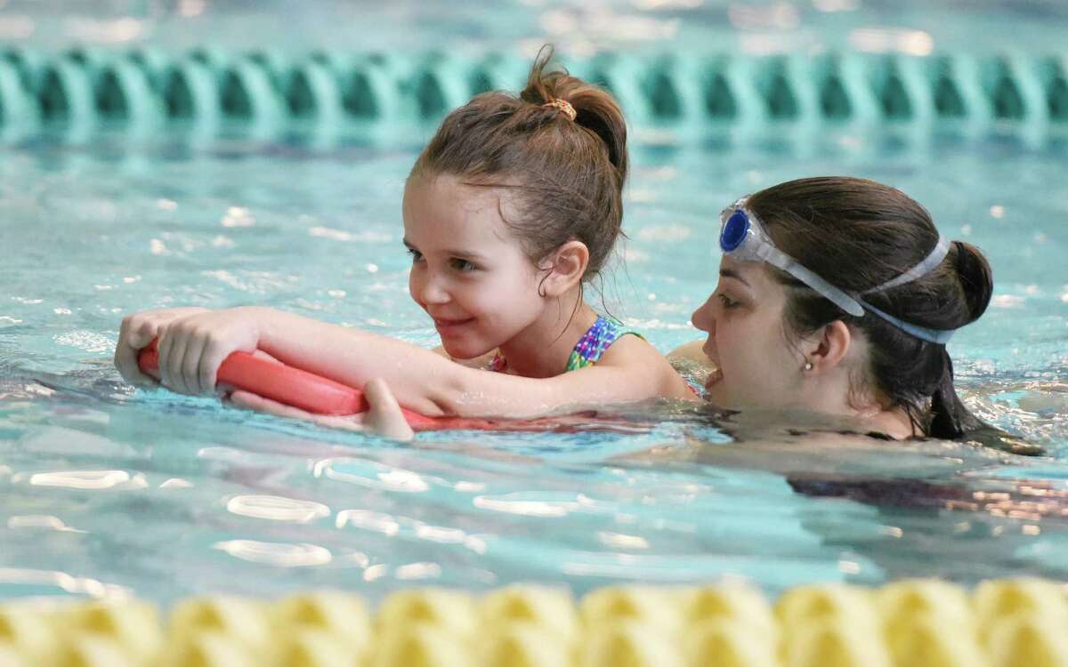 Maria Sucic, 5, of Greenwich, floats with help from youth development instructor Ashley Culver during a swim lesson at the ZAC Foundation swim camp at the Boys and Girls Club of Greenwich in Greenwich, Conn. Monday, April 11, 2016. More than 100 Greenwich kids are participating in the week-long ZAC Foundation swim camp at the Boys and Girls Club where they will spend time swimming in the pool while also learning important lessons about swimming safety. Karen and Brian Cohn founded The ZAC Foundation in 2008 in honor of their 6-year-old son, Zachary, who died after his arm became entrapped in a pool drain.