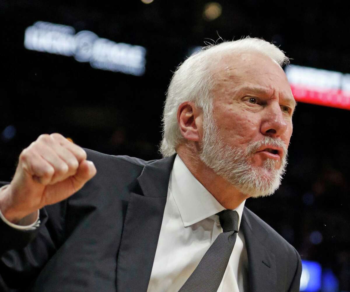 SAN ANTONIO,TX - APRIL 10: San Antonio Spurs head coach Gregg Popovich reacts during the game against the Golden State Warriors at AT&T Center on April 10, 2016 in San Antonio, Texas. The Warriors won 92-86, tying the all-time record for wins in a season with 72. NOTE TO USER: User expressly acknowledges and agrees that , by downloading and or using this photograph, User is consenting to the terms and conditions of the Getty Images License Agreement.