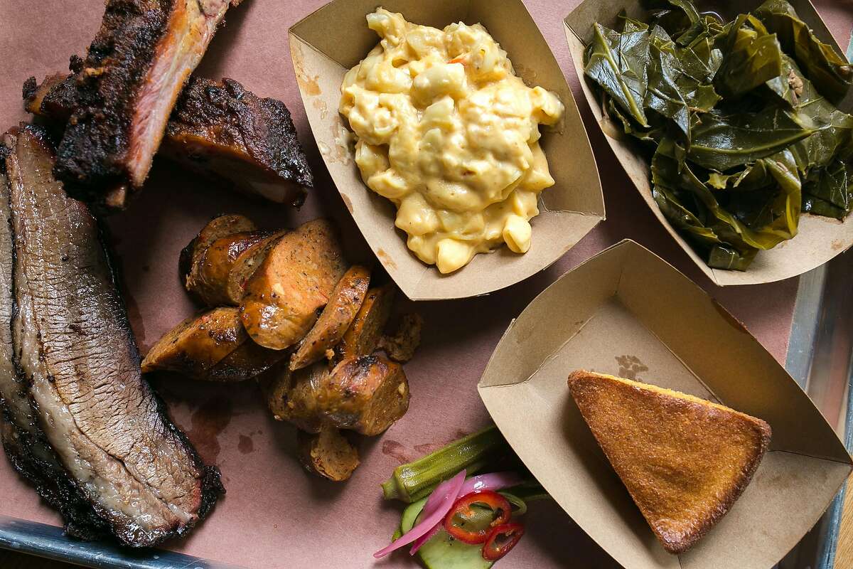 The 3 meat platter with brisket, ribs, hot links, greens, mac and cheese and cornbread at Black Bark BBQ in S.F.