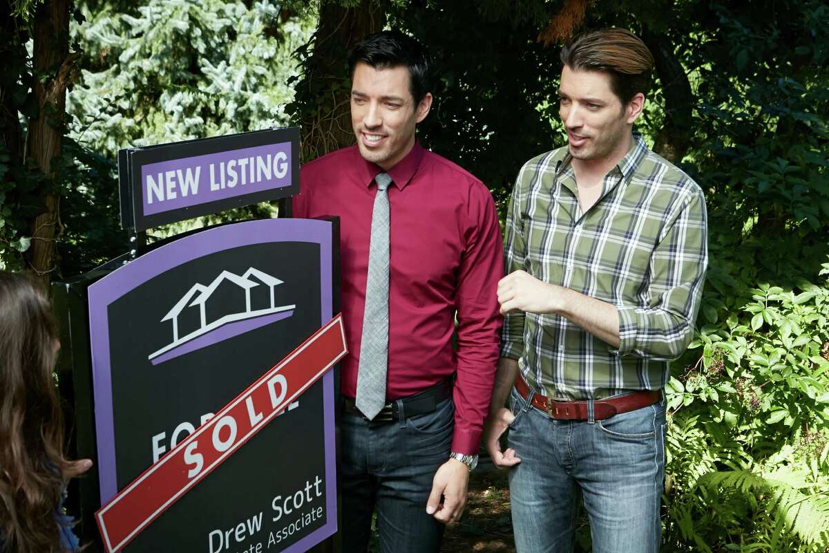 Identical twin brothers Jonathan, left, (L) and Drew Scott are the stars of `Property Brothers' on HGTV. Jonathan is a contractor and Drew is a real estate guy. On the show they find run-down homes and fix them up for couples on a budget. >>Click to see the brothers' renovation advice. 