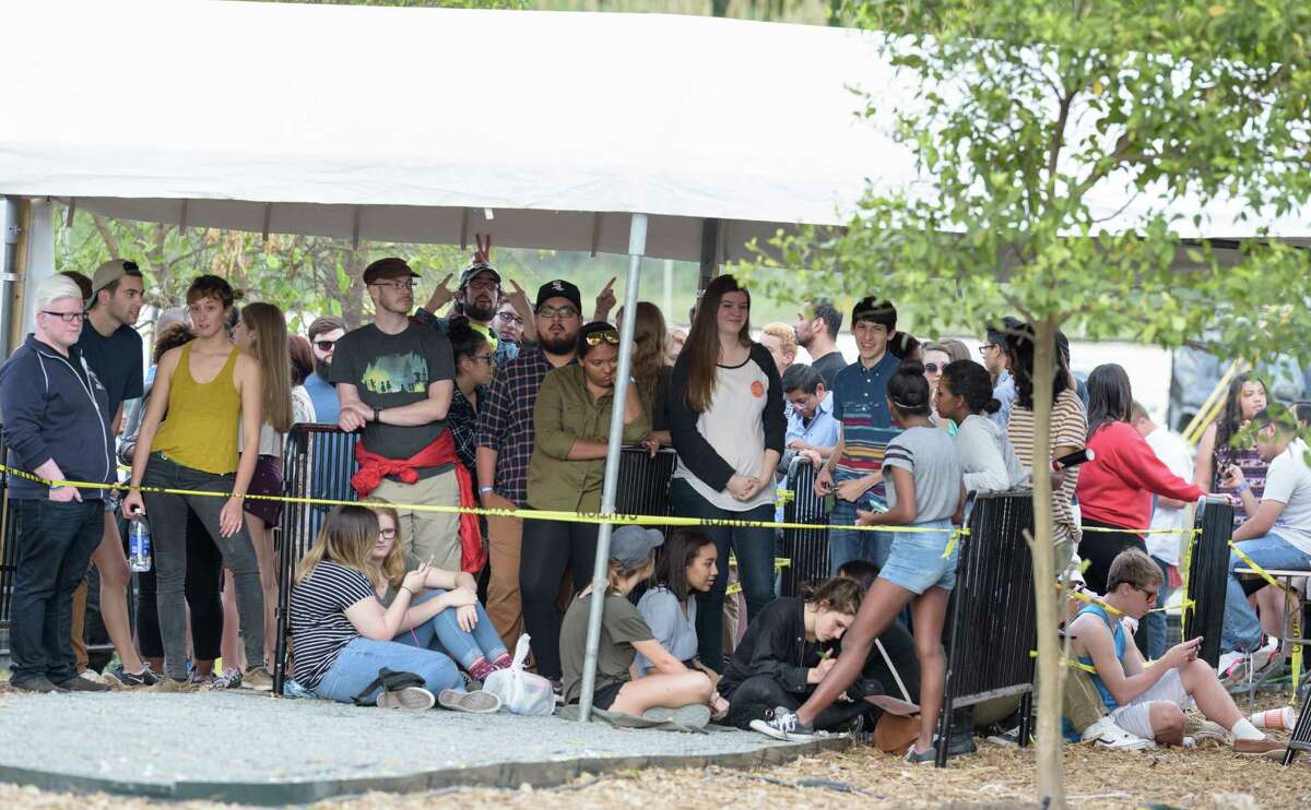 Fans wait to get in at a sold-out concert at the 6-acre property. The venue's developer called the show a success.